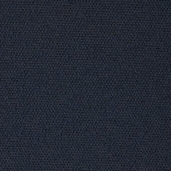 Dark blue fabric texture with a dense, nubby weave and subtle irregular pattern; label reads “ditre italia princess 600”.